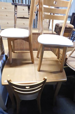 Lot 1085 - A 20thC beech extending dining table, 76cm...