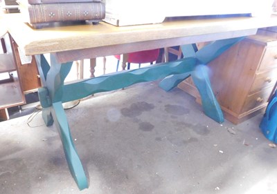 Lot 1086 - An oak dining table, the rectangular top with...