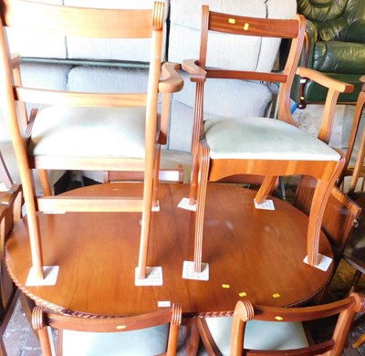 Lot 1090 - A 20thC extending dining table, the lozenge...