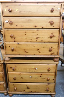 Lot 1130 - Two pine chests of drawers, comprising a three...