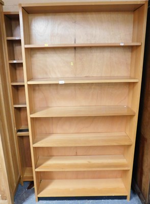Lot 1118 - Two open bookcases, 275cm high, 91cm wide,...