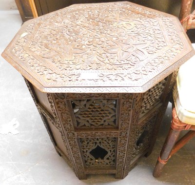 Lot 1120 - An Anglo Indian carved hardwood table, the...
