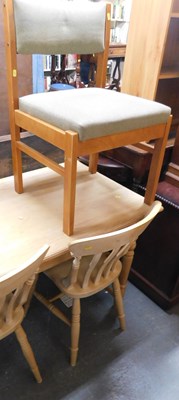 Lot 1083 - A kitchen table, together with two beech...