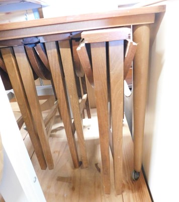 Lot 1138 - A teak nest of tables.