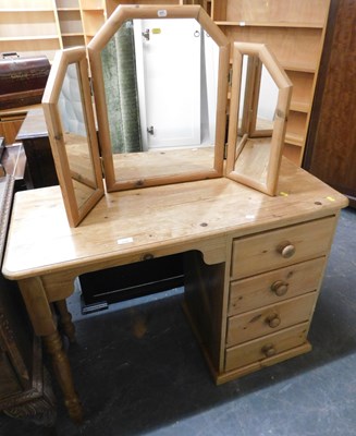 Lot 1143 - A pine dressing table, with four drawers to...