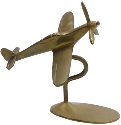 Lot 630 - A brass desk stand modelled as a Spitfire,...