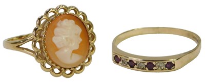 Lot 474 - A 9ct gold ruby and diamond seven stone...
