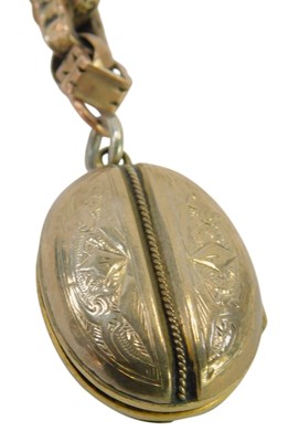 Lot 480 - A Victorian oval hair locket pendant, with...