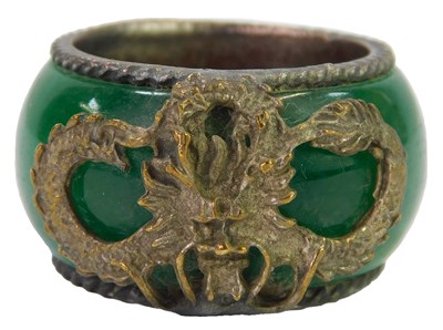Lot 482 - An Oriental influence dress ring, with a wide...