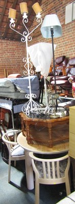 Lot 1043 - Two standard lamps, being metal, one smaller...