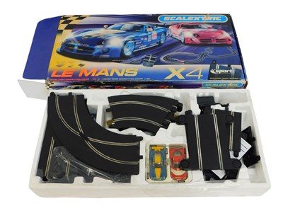 Lot 604 - A Scalextric Le Mans X4 slot car set...