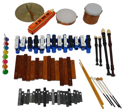 Lot 569 - A group of musical instruments, including a...