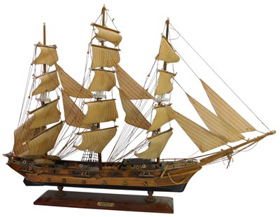Lot 376 - A wooden model of a frigate, with rigging and...