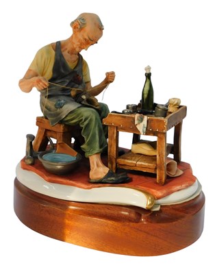 Lot 502 - A Capodimonte figure group modelled as The...