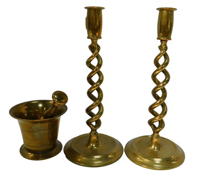 Lot 504 - A brass pestle and mortar, the mortar 9cm high,...