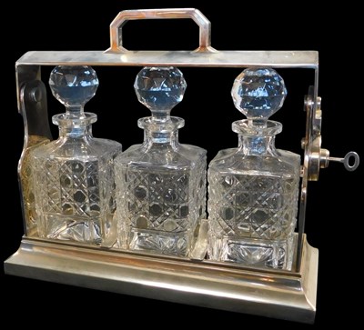 Lot 509 - An early 20thC silver plated three division...