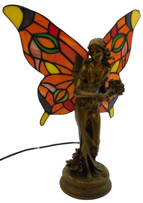 Lot 522 - A 20thC table lamp, modelled as a fairy with...