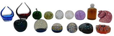 Lot 538 - A group of glass paperweights, to include a...