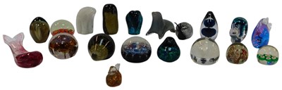 Lot 539 - A group of glass paperweights, to include a...