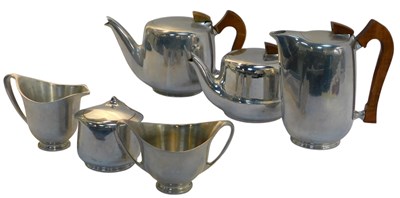 Lot 560 - A Picquot ware part service, comprising teapot,...