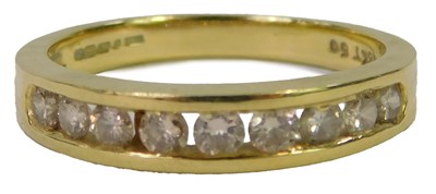 Lot 612 - An 18ct gold and diamond nine stone...