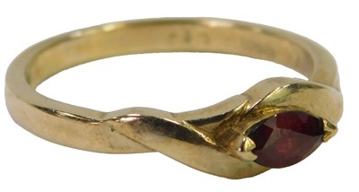 Lot 617 - A garnet dress ring, the marquise cut garnet...