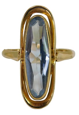 Lot 630 - An aquamarine up-finger ring, yellow metal,...