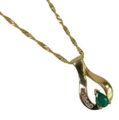 Lot 632 - An emerald and diamond loop pendant, yellow...
