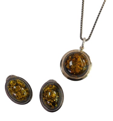 Lot 635 - A reconstituted amber necklace and earring...