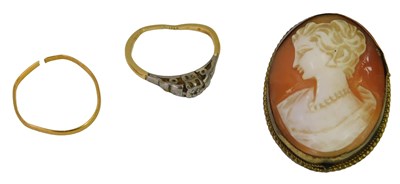 Lot 638 - A 22ct gold wedding band, cut, 0.8g, together...