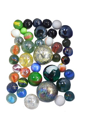Lot 650 - A group of 20thC glass marbles, to include cat'...
