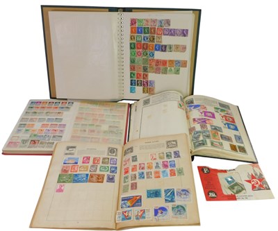Lot 668 - Four stamp albums containing world and GB...