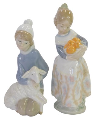 Lot 681 - Two Lladro porcelain figures, modelled as a...