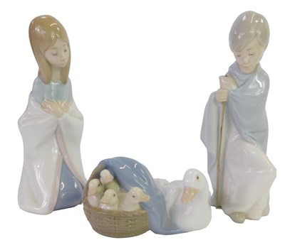 Lot 682 - Three Lladro porcelain figures, modelled as a...