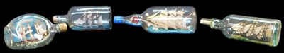 Lot 687 - Four ships in glass bottles, the largest 32cm...