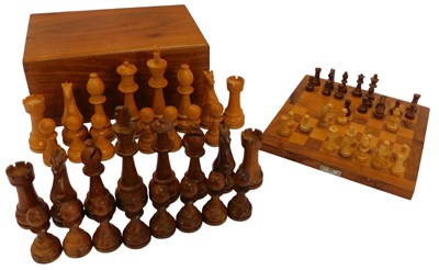 Lot 689 - Two carved hardwood chess sets, height of...