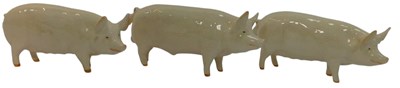 Lot 694 - Three Beswick pottery pig figures, comprising...