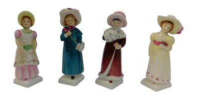 Lot 705 - Four Royal Doulton porcelain figures from the...