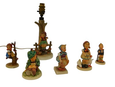 Lot 708 - A group of Goebel Hummel, to include a table...
