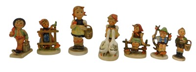 Lot 709 - Seven Goebel Hummel figures, to include young...