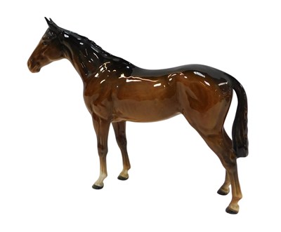 Lot 710 - A Beswick figure modelled as a bay...