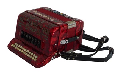 Lot 719 - A Fantini button accordion, in red, in a...