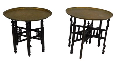 Lot 720 - Two Indian brass top tables, each 58cm...