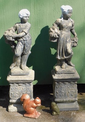 Lot 777 - A pair of painted composition stone garden...