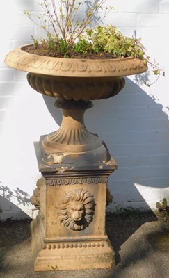 Lot 775 - A Victorian terracotta glazed campana style...