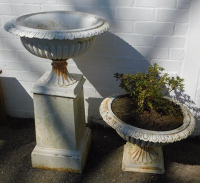 Lot 774 - A pair of painted cast iron campana style...