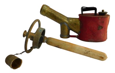 Lot 758 - A red painted and brass flame torch or...