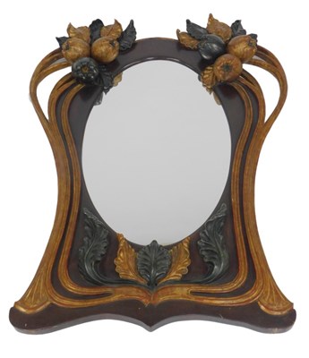 Lot 785 - A gilt composition wall mirror, the elaborate...