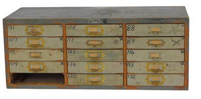 Lot 788 - A bank of industrial printer's drawers, label...