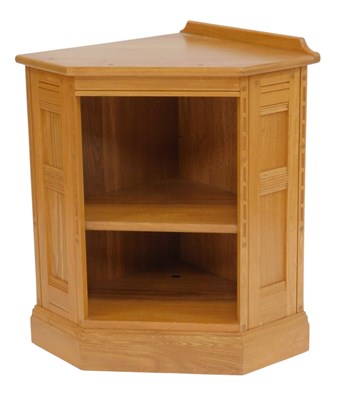 Lot 801 - An Ercol elm low corner unit, with single...